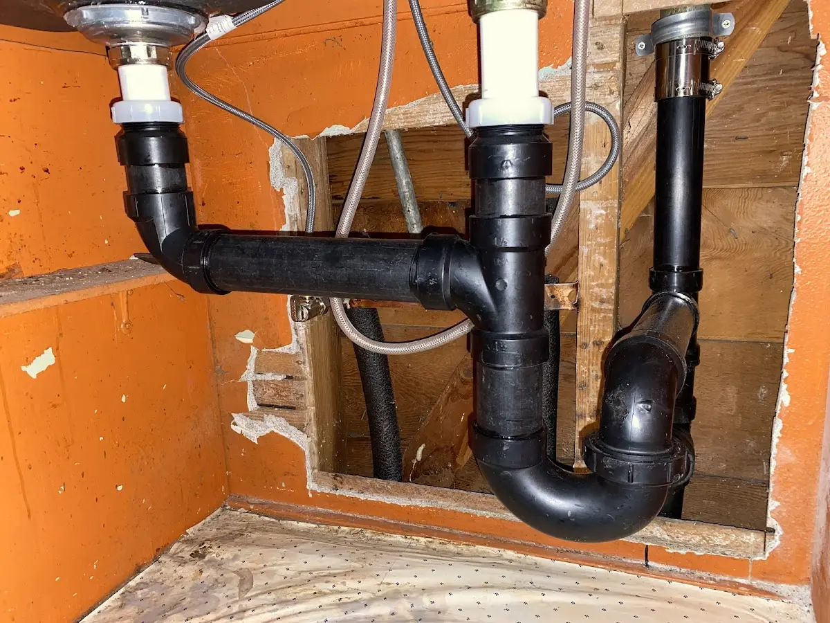 Professional Garbage Disposal Repair equipment and tools on the job in St. Joseph